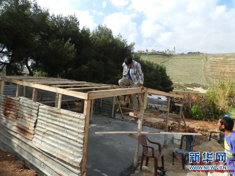 http://news.xinhuanet.com/world/2014-12/29/127343020_14198176020031n.jpg